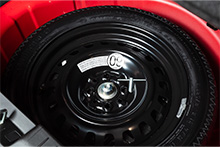 TRABA DE SEGURIDAD PARA RUEDA AUXILIO